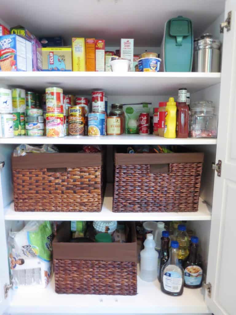 Pantry organization using baskets.