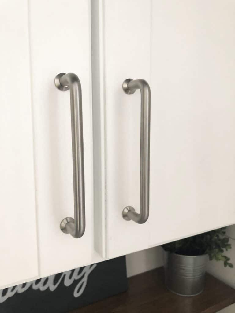 The new door handles are simple and silver plated from IKEA.