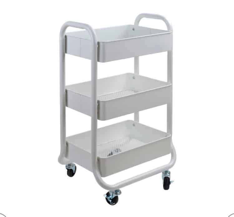a three tiered metal cart in white.