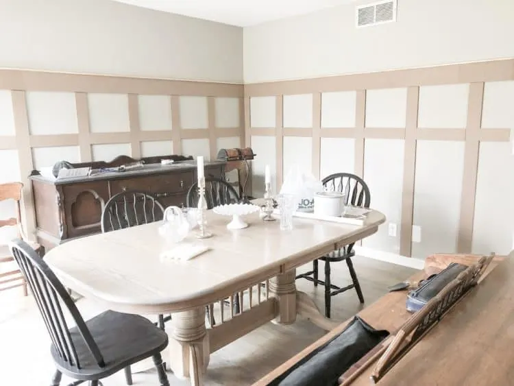 DIY Board and Batten, all the wood is up on the walls with my dining table in the center of the room.