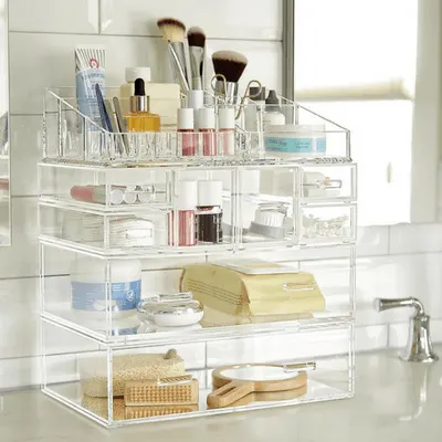 I am all about getting my home organized right now after all the DIY projects.  Something caught my eye the other day, my daughters vanity.  It's so organized and she has done an amazing job of doing some DIY stuff for organizing as well as purchasing some things.  So I thought what a great idea to put together a post on makeup organization ideas.
