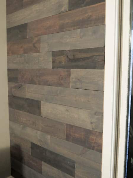 A close up of the reclaimed wood wall.