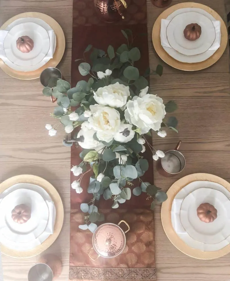 A birds eye view of the thanksgiving table setting.