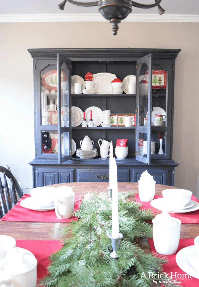 Farmhouse Christmas Dining Room. White and red theme