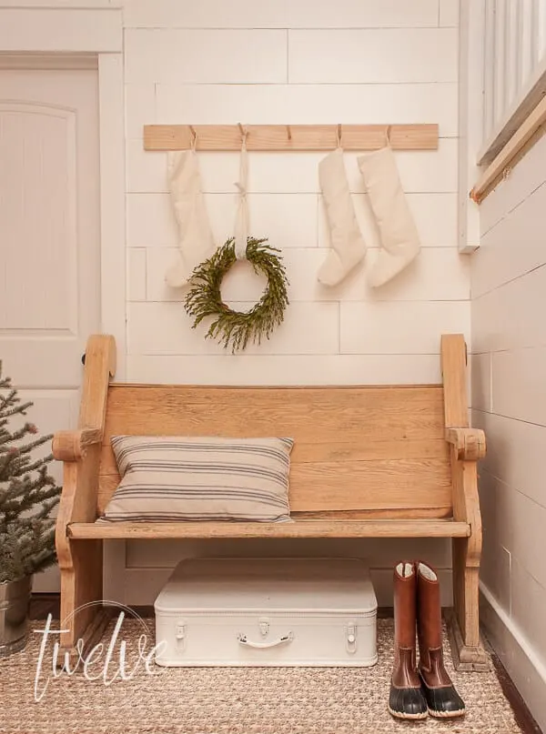 Farmhouse Christmas Decor, a Front entryway with a bench and lovely christmas decorations