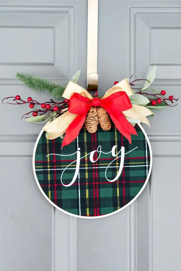 Farmhouse Christmas Decor, a hoop wreath with the word joy written on it