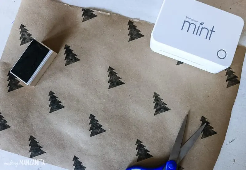 diy gift wrap ideas using a christmas tree stay and brown craft paper