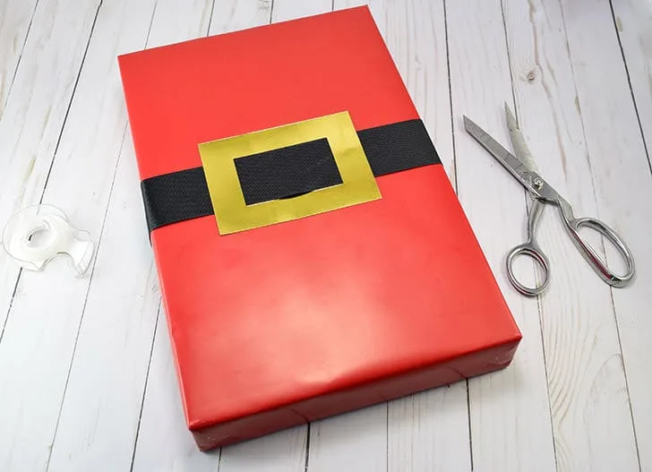 DIY Gift Wrap Ideas, a gift wrapped like Santa's red suit