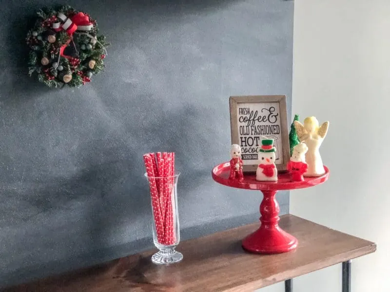 Cake stand with Christmas Kitchen Decorations, paper straws and my Christmas Buckeye wreath.