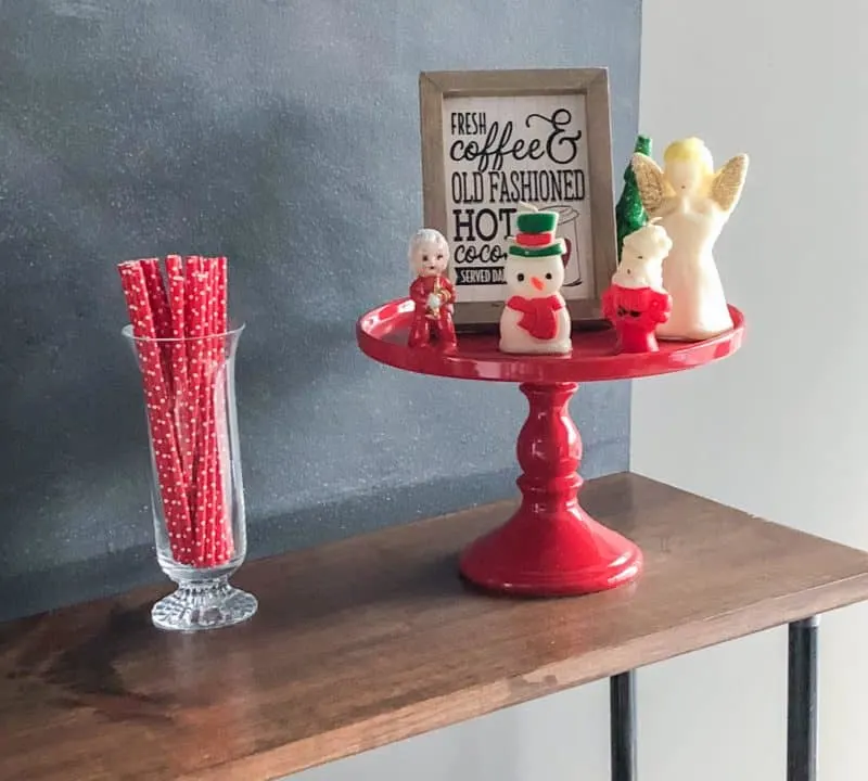 Cake stand featuring my Christmas Kitchen Decorations, vintage candles and a coffee farmhouse sign.
