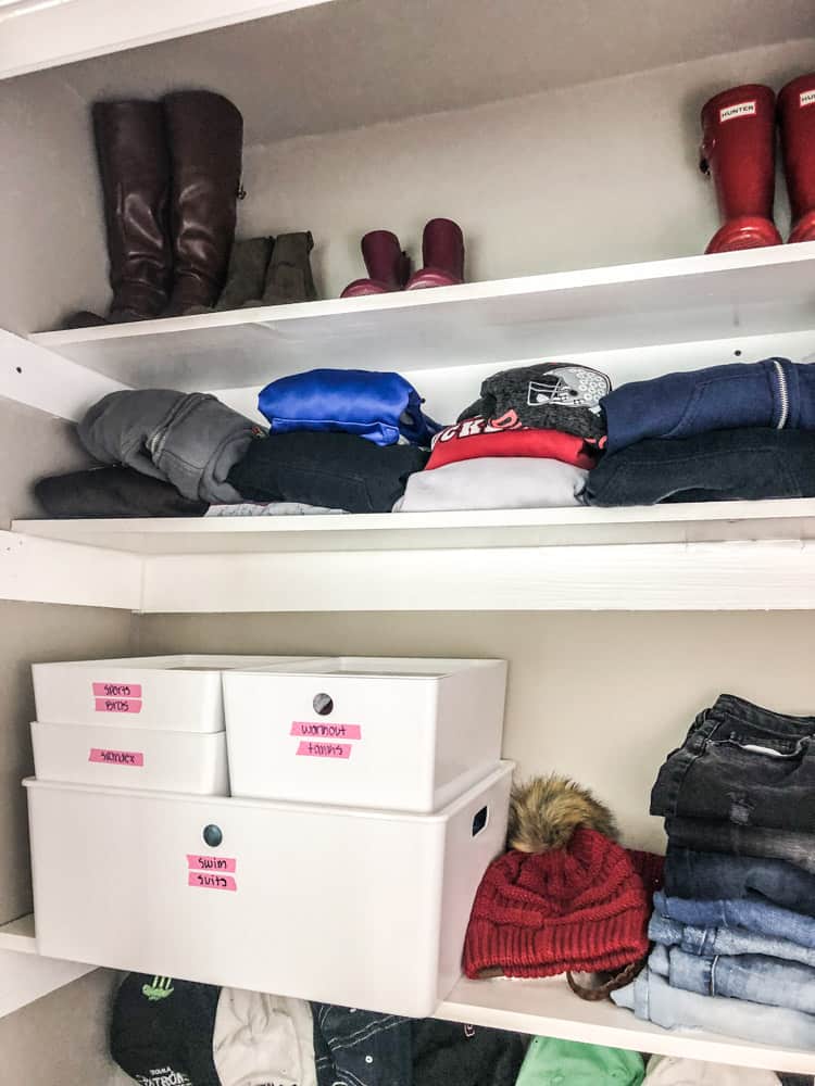 Closet Organization new shelves with stacking boxes.