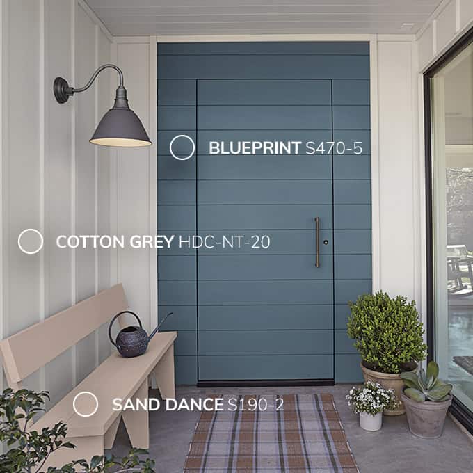 Behr paint color of the year Blueprint, a smokey blue color.