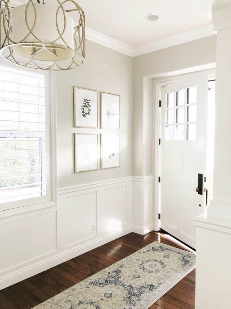 An entryway with the greige paint color pale oak.