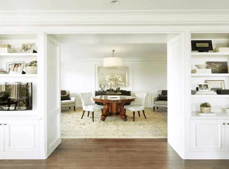 White Dove greige paint color on the walls of a dining room.