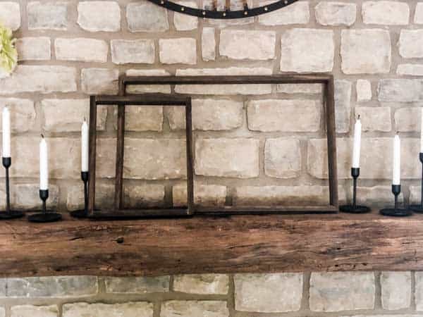 Both of the rustic wood frames are sitting on my mantel.