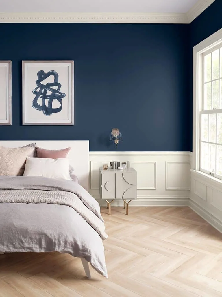 An example of Sherwin Williams Naval used in a bedroom on the walls.