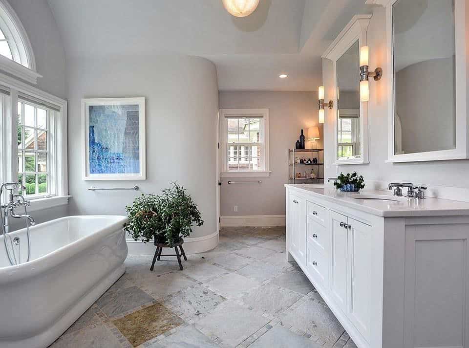 A bathroom painted in Sherwin Williams Agreeable Gray.