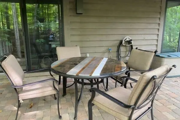 DIY Table Top made of leftover wood and a spray painted table and chairs.