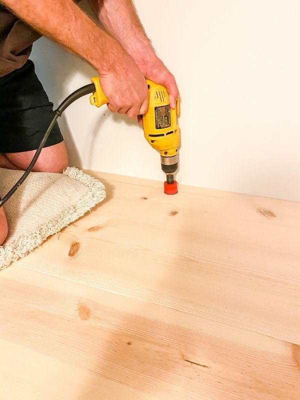 My husband is drilling a hole in the countertop in order for cords to go down to reach the outlet.