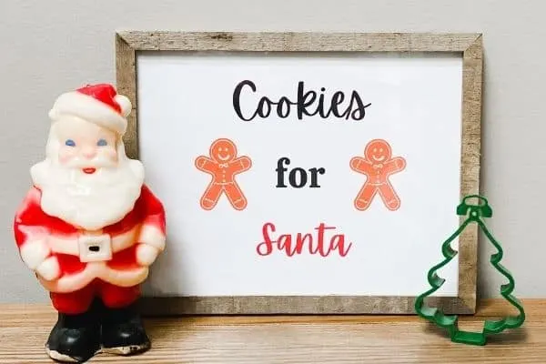 A farmhouse Christmas Printable that says Cookies for Santa and has 2 gingerbread men on it.