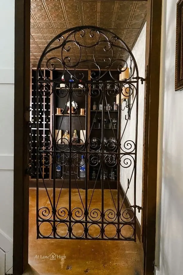 The entrance to the wine cellar with the iron gate.