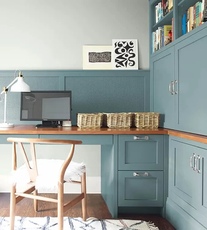 Sherwin Williams Agean Teal painted on cabinets in a home office.
