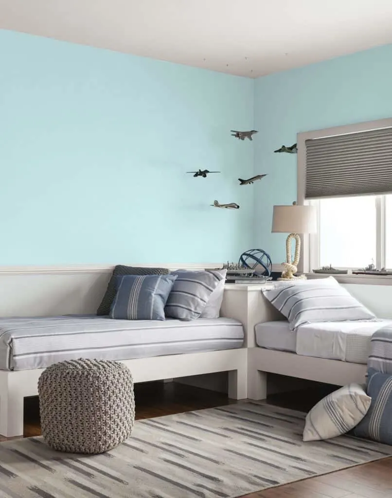 PPG's Misty Aqua painted on the walls in a bedroom.