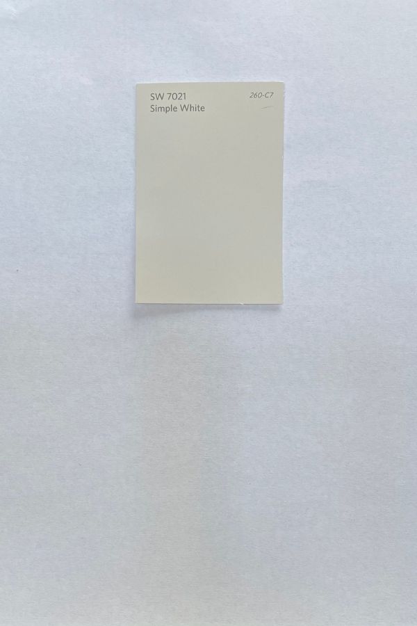 This paint chip is Sherwin Williams Simply White.