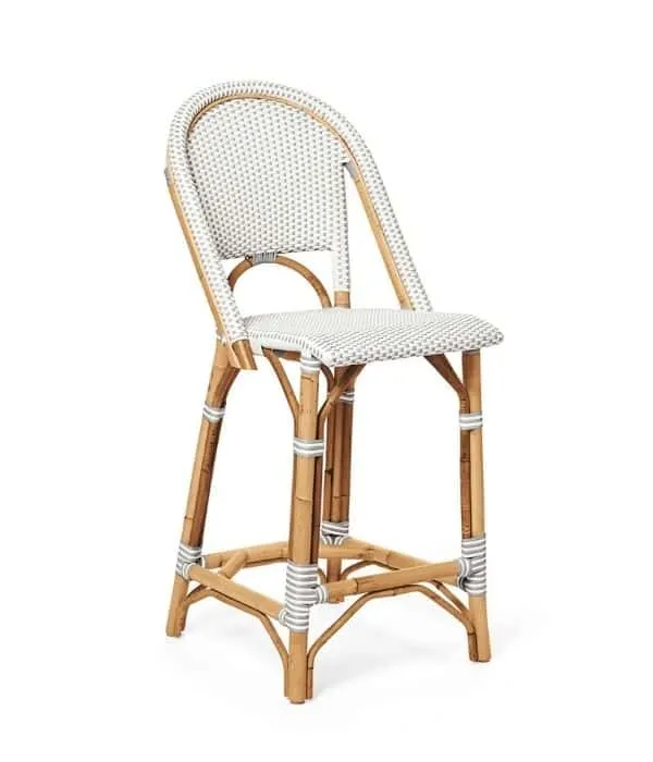 This bar stool has a bamboo base and a woven top with woven accents on the braces on the bottom.