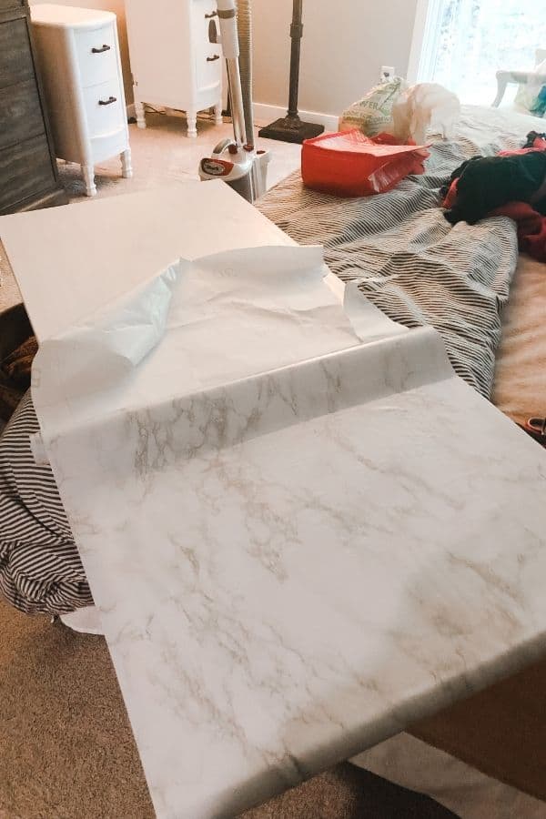 Here I am halfway through attaching the marble contact paper.