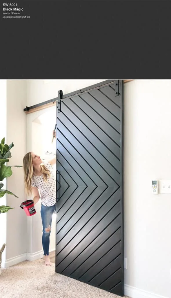 A sliding barn door with Black Magic paint color on it.