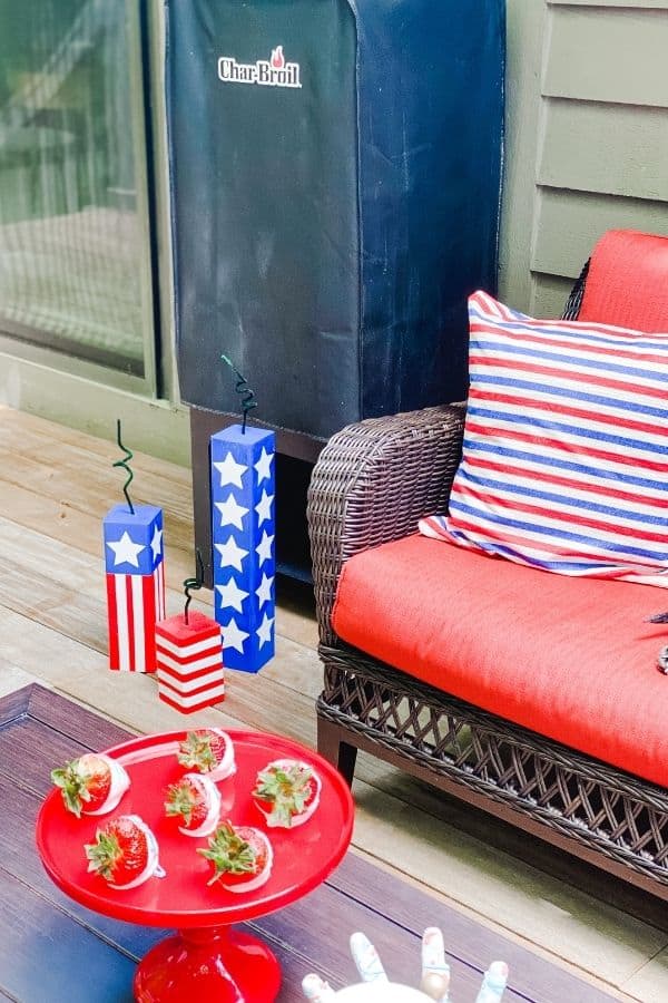 You can see my diy wood firecrackers on the deck next to my couch.