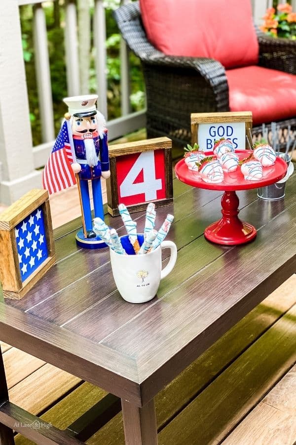 the table with my farmhouse signs and food for the holiday.