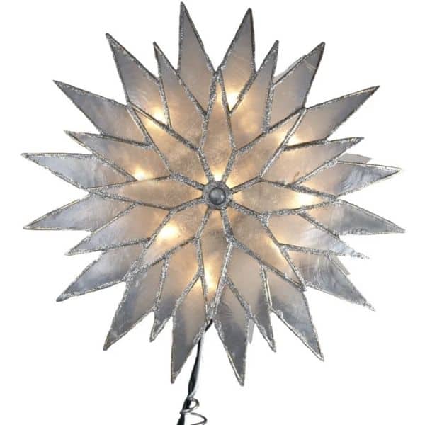 this tree topper is made of capiz and silver in the shape of a sunburst.