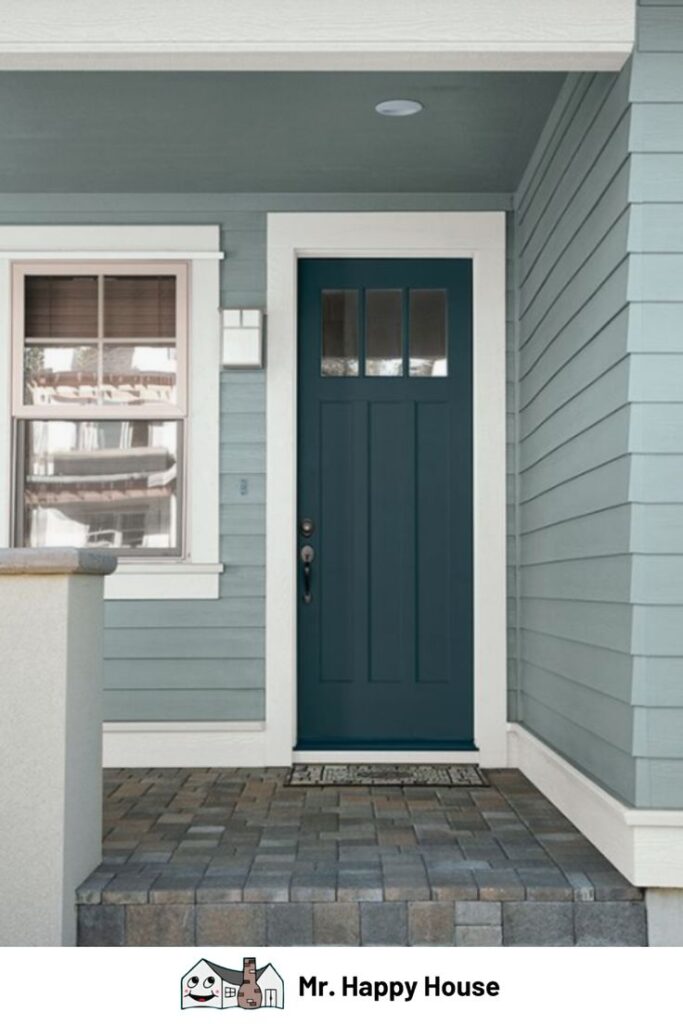 Network Gray on the siding, white trim, a dark wood door and gray pavers for a front porch.