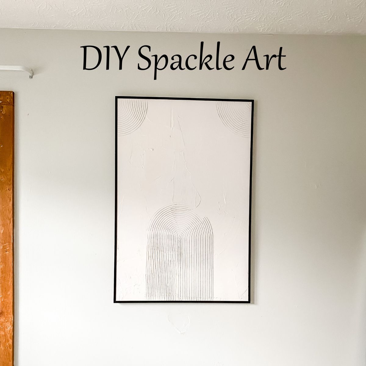 DIY spackle art hanging in the wall with text overlay.