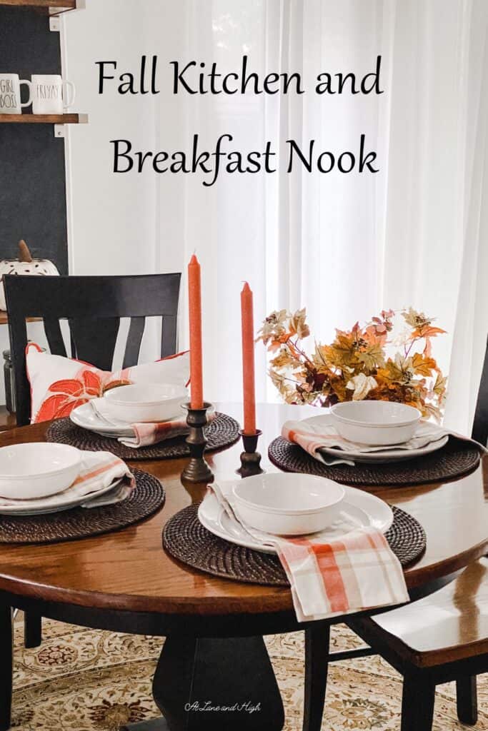 A view of my kitchen table with fall dishes and plaid napkins and text overlay for pinterest.