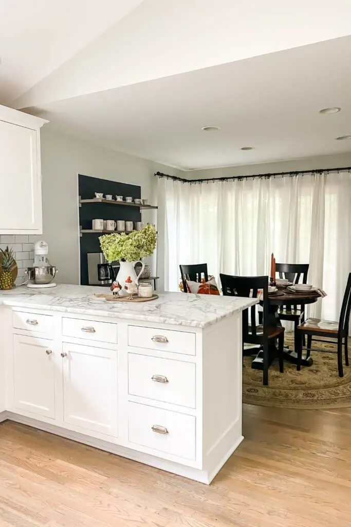 My kitchen counter with a fall vignette and my breakfast nook with fall table setting.