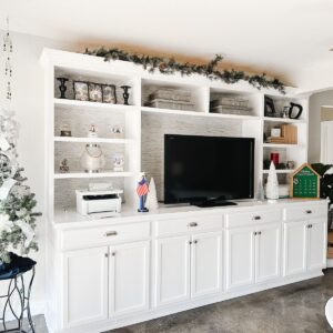 The built-ins with tons of Christmas trees, and advent calendar, a snow globe collection and a Marine nutcracker.