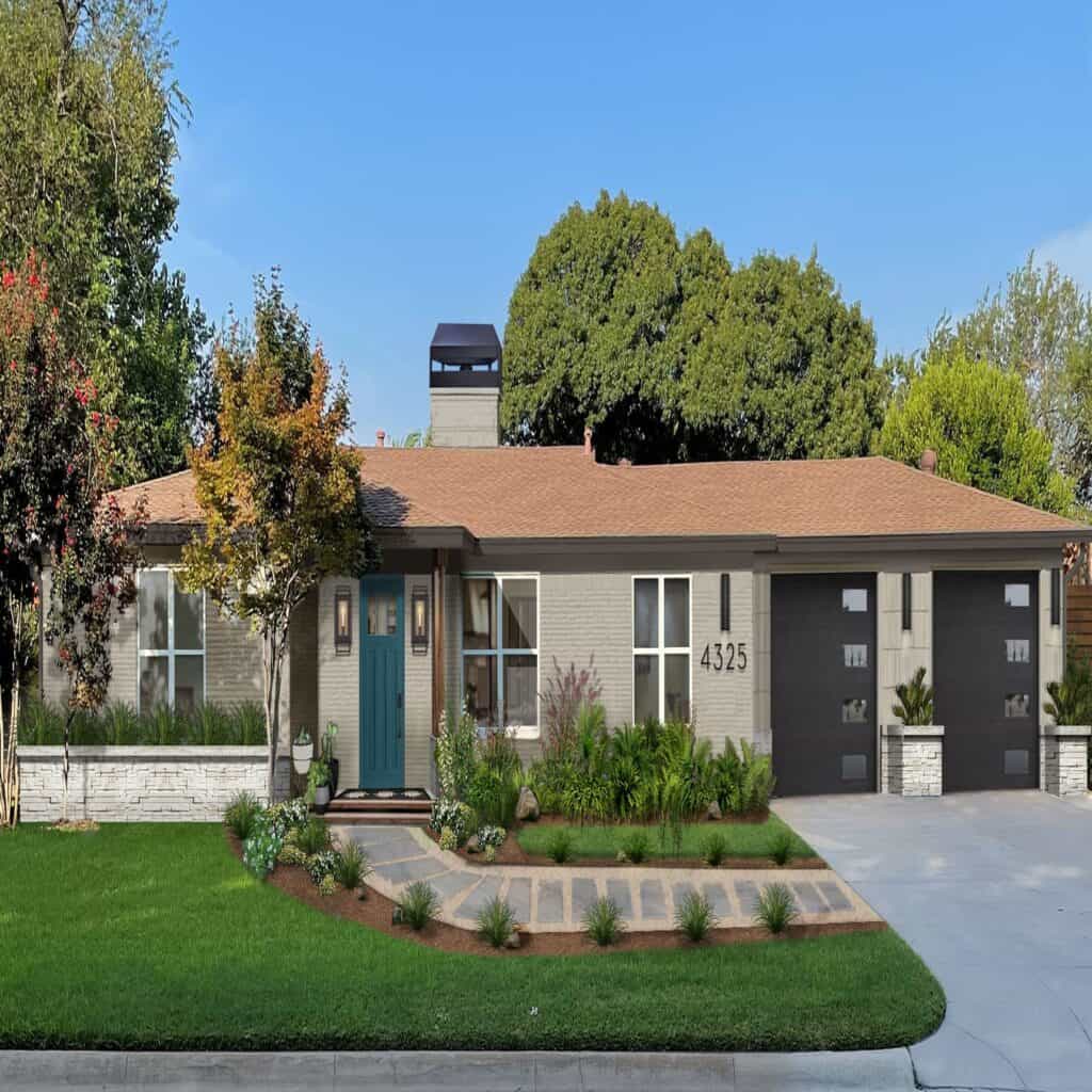 Sherwin Williams Jogging Path on the exterior of a brick home with a blue door and dark garage doors.