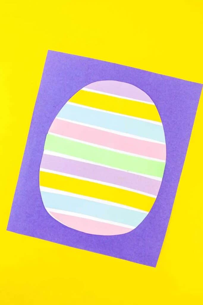 A egg crafted from paper stripes.