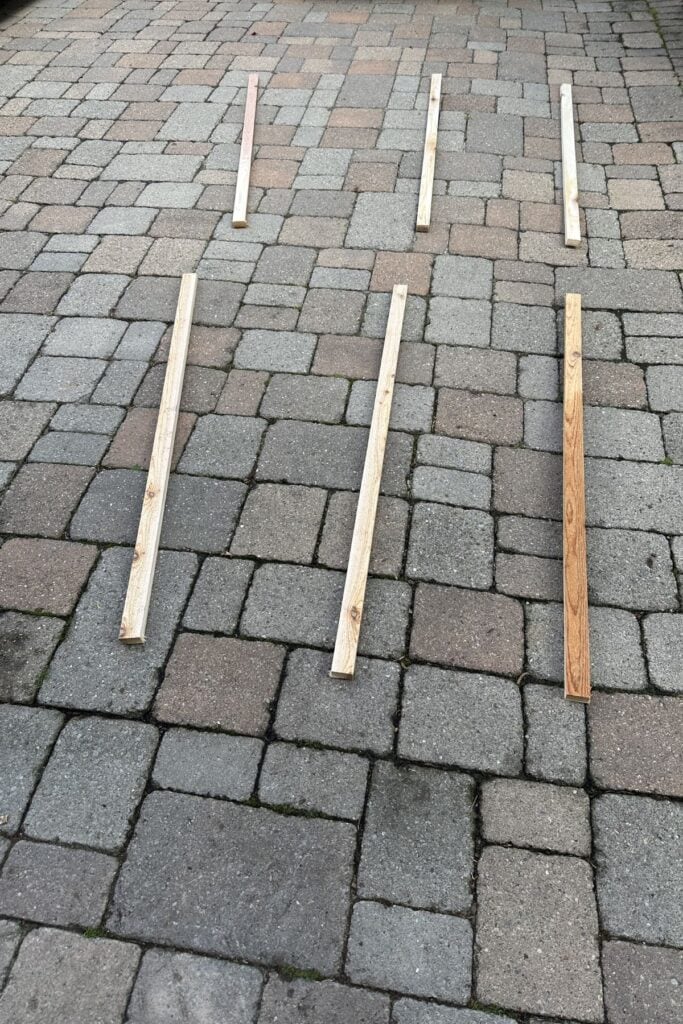 The first set of wood cut and laid out on y driveway.