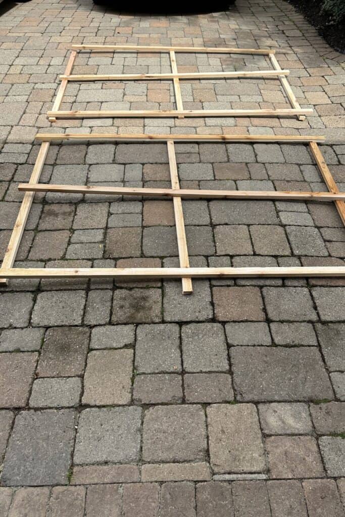 All the wood cut and laid out on the driveway before being secured together.