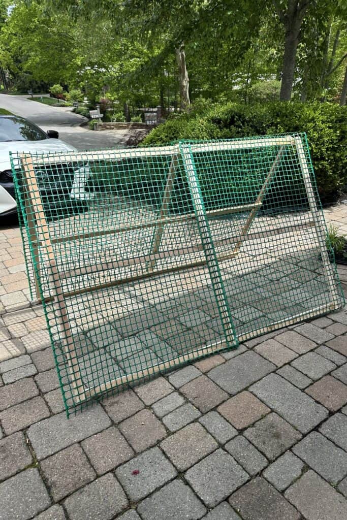 The finished A-framed trellis in my driveway after I finished building it.