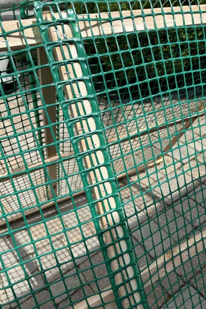 The fencing added tot he frame with an overlap in the center.