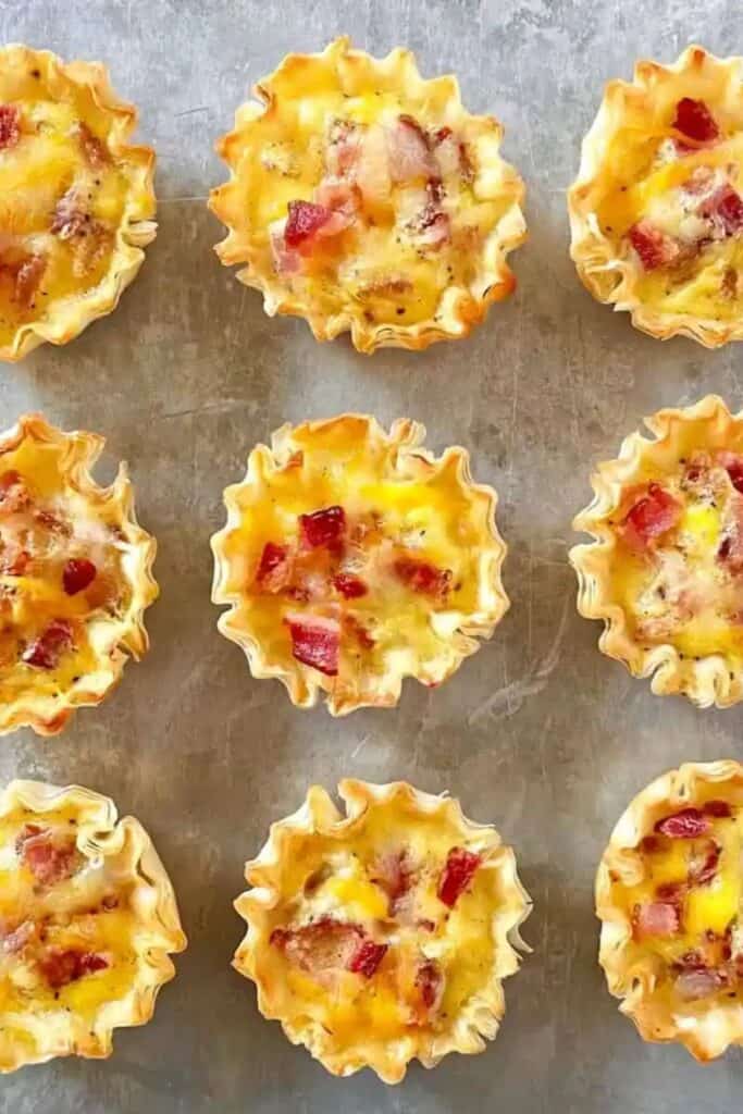 bacon and cheese in a phyllo dish on a concrete surface.