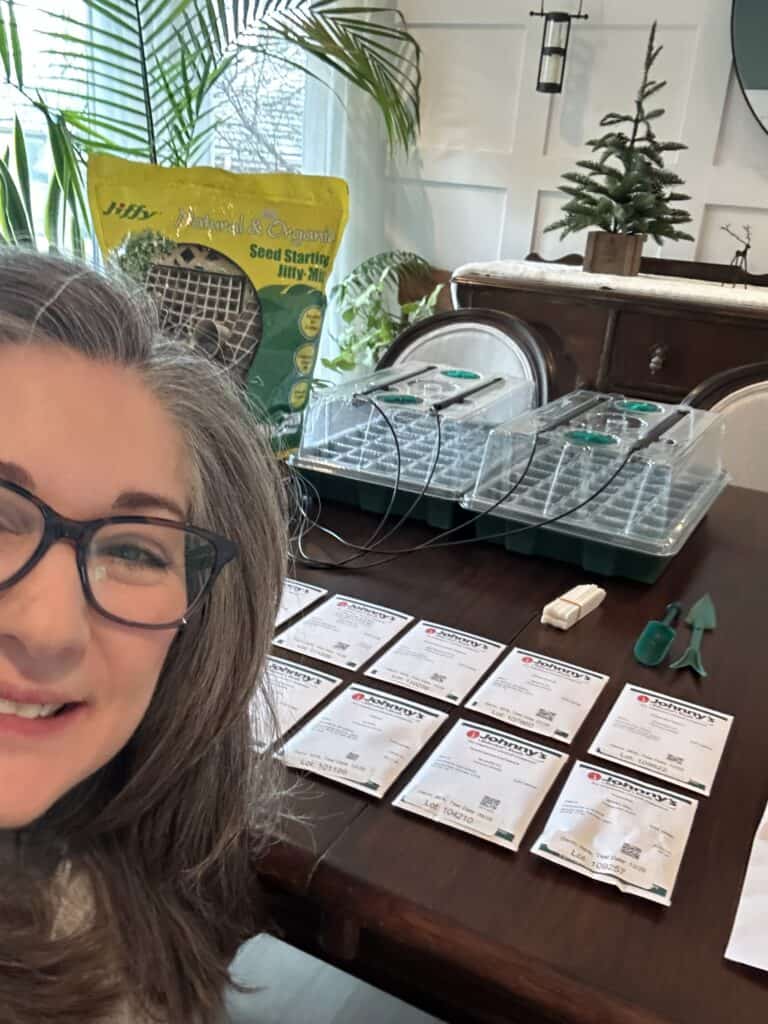 Me with all the seeds and plant starting kit I bought.